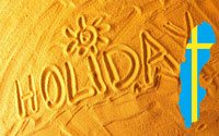 Scritta holiday sulla sabbia